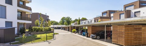 Die Gemeinde als Gestalter der Energiewende Eine Straße in einem modernen Wohngebiet