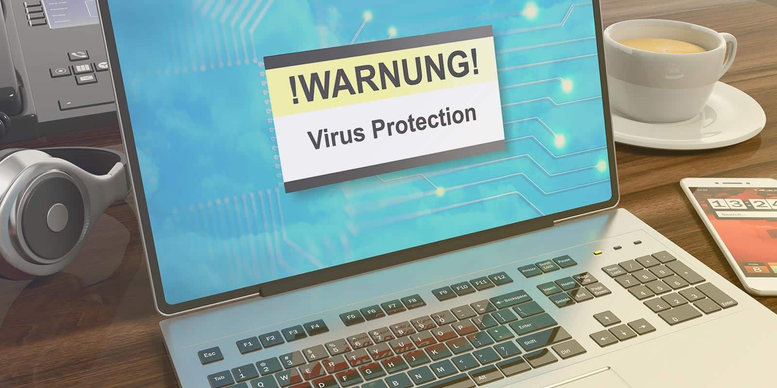 Laptop auf dem eine Viruswarnung angezeigt wird | EWE macht Schule